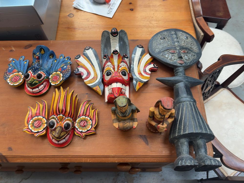 Lot 489: An Assortment of Sri Lankan and West African style Carved Wooden Decorative Items including Raksha Masks