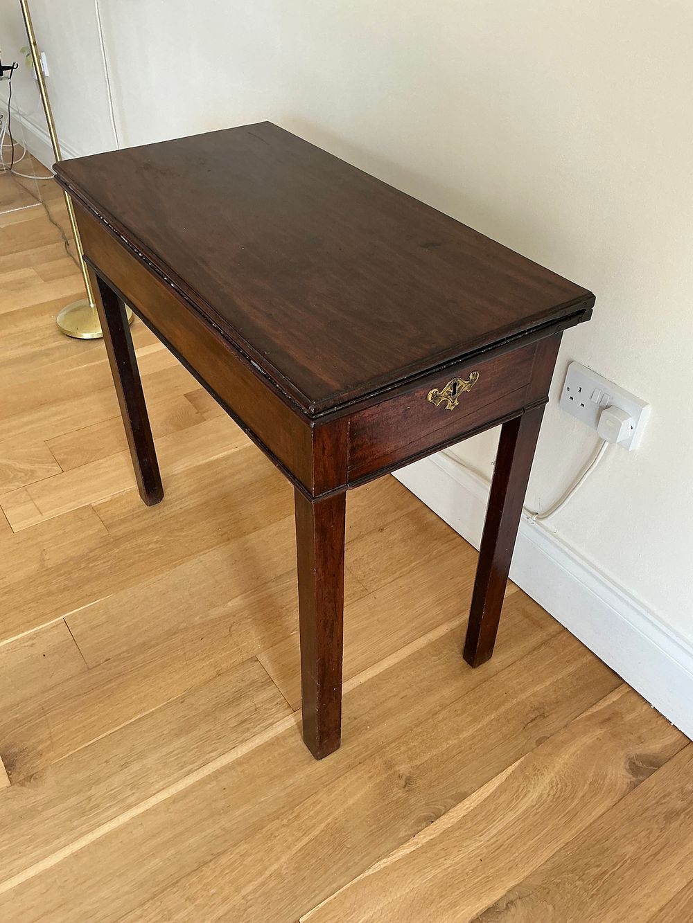 Lot 492: Two Antique Mahogany Tables Including a George III style Tea Table and a Victorian style Sutherland Table