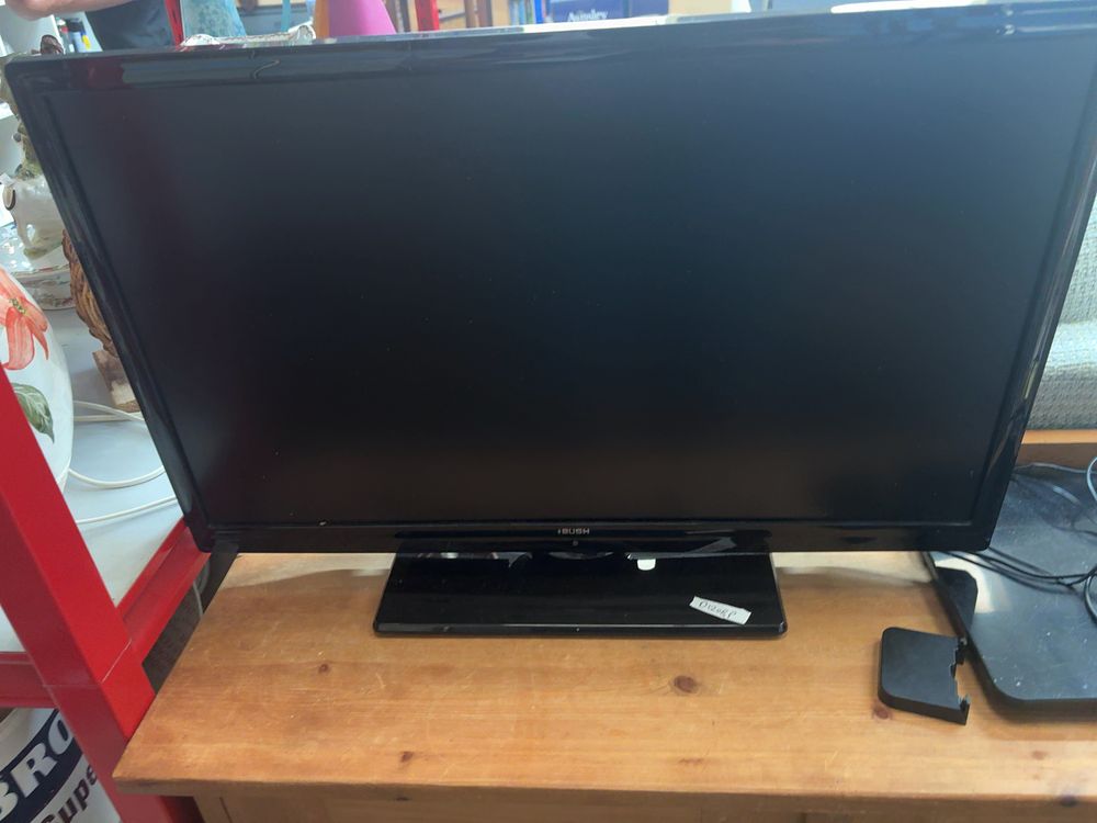 Lot 499: A Bush Television with Vivanco Indoor Antenna and Power Adapter
