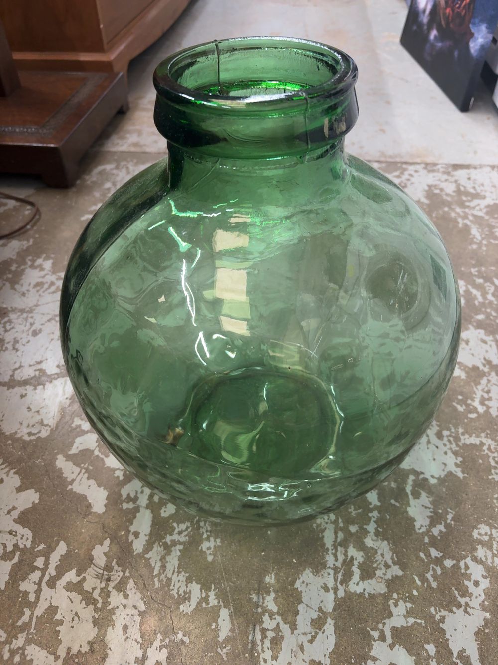 Lot 525: A Large Green Hand Blown Glass Demijohn