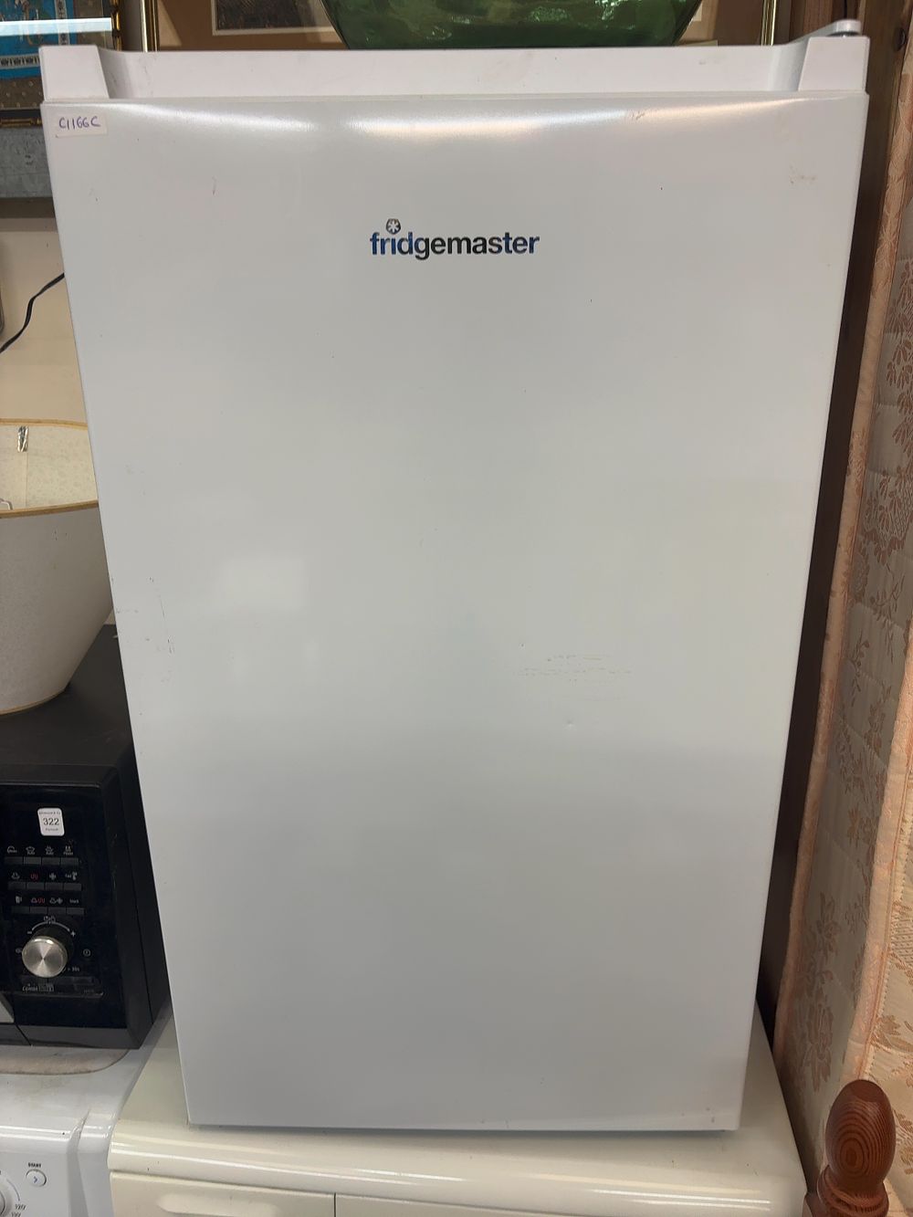 Lot 526: A Fridgemaster Under-counter Refrigerator with Internal Freezer Compartment