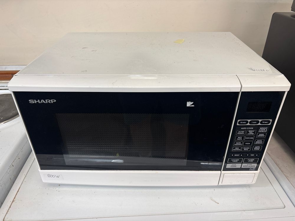 Lot 536: A Sharp White 800W Microwave Oven