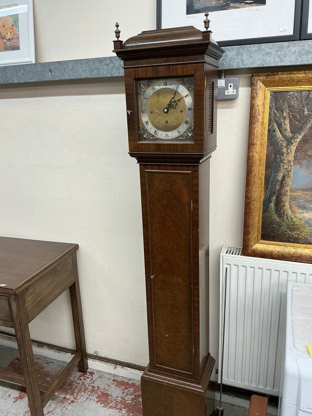 Lot 539: An Elliott of London Walnut Cased Longcase Clock with Original Purchase Receipt