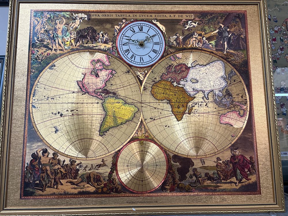 Lot 540: A Gilt Framed Gold Foil World Map Wall Clock marked Aquarius