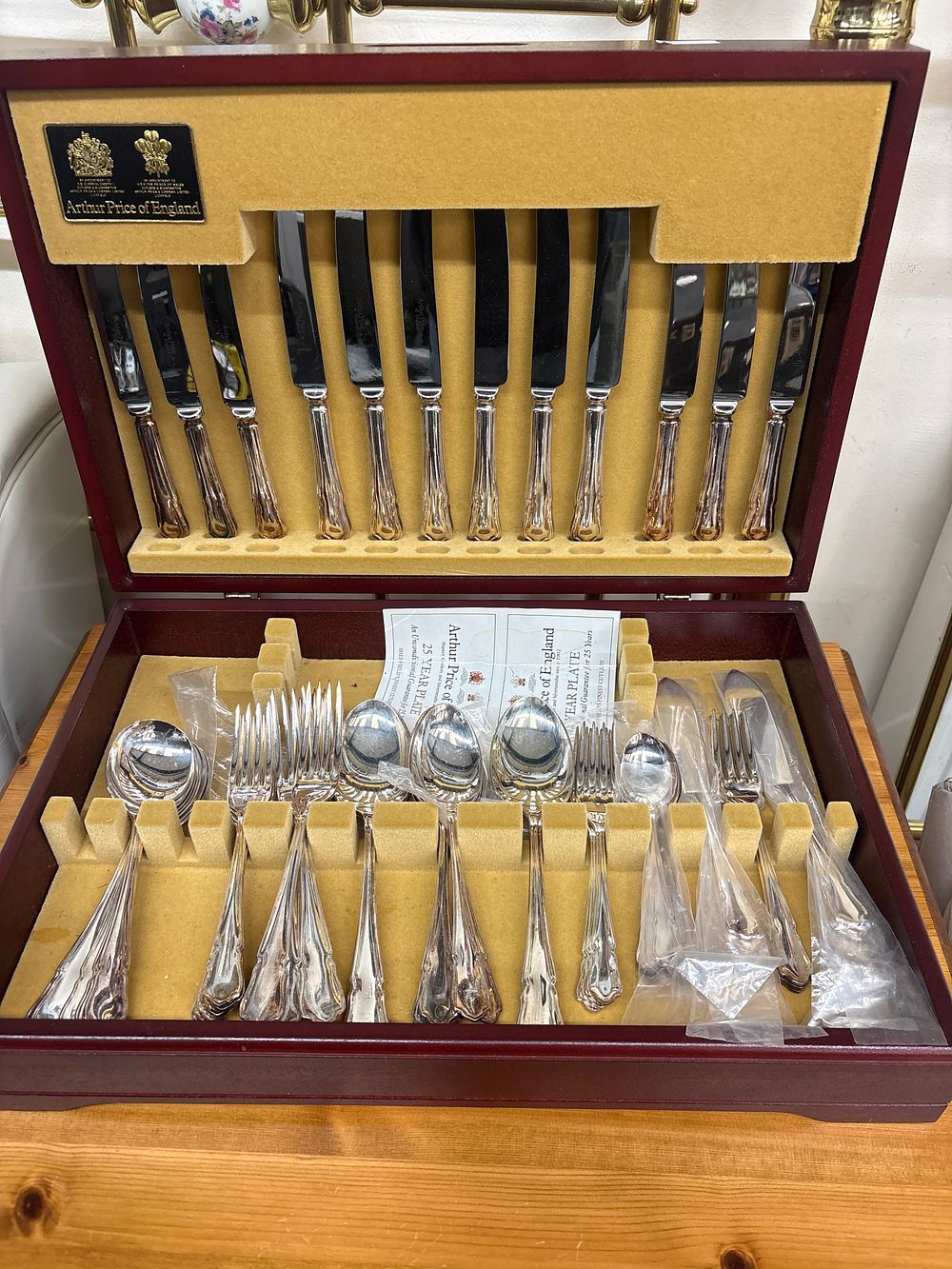 Lot 553: A Cased Set of Forty Four Arthur Price of England Silver Plated Cutlery Pieces in the Dubarry Pattern