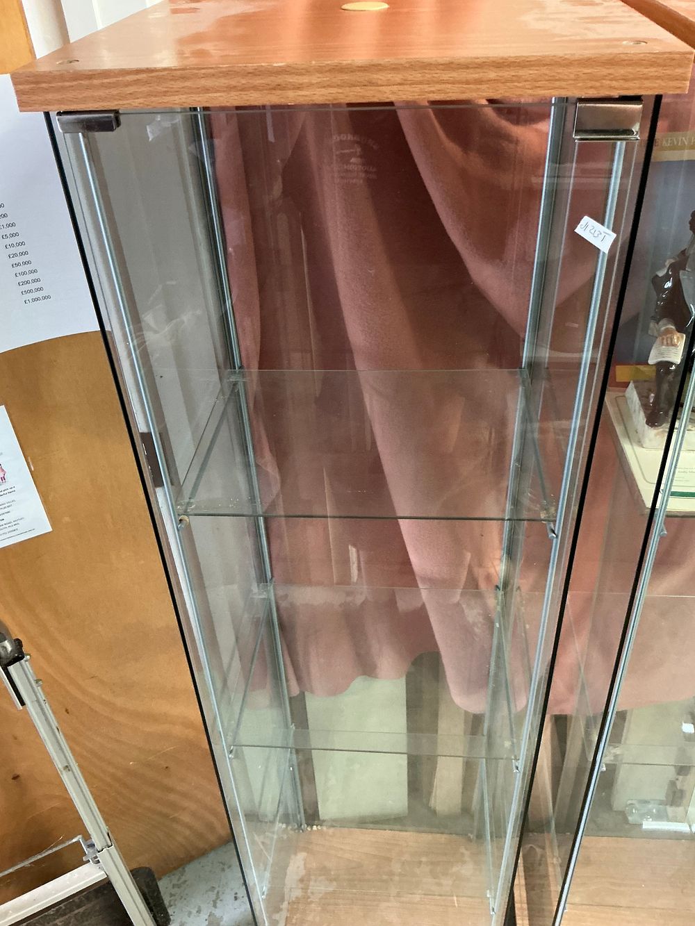 Lot 555: A Contemporary Wood-Effect and Glazed Glass Horizontal Display Cabinet