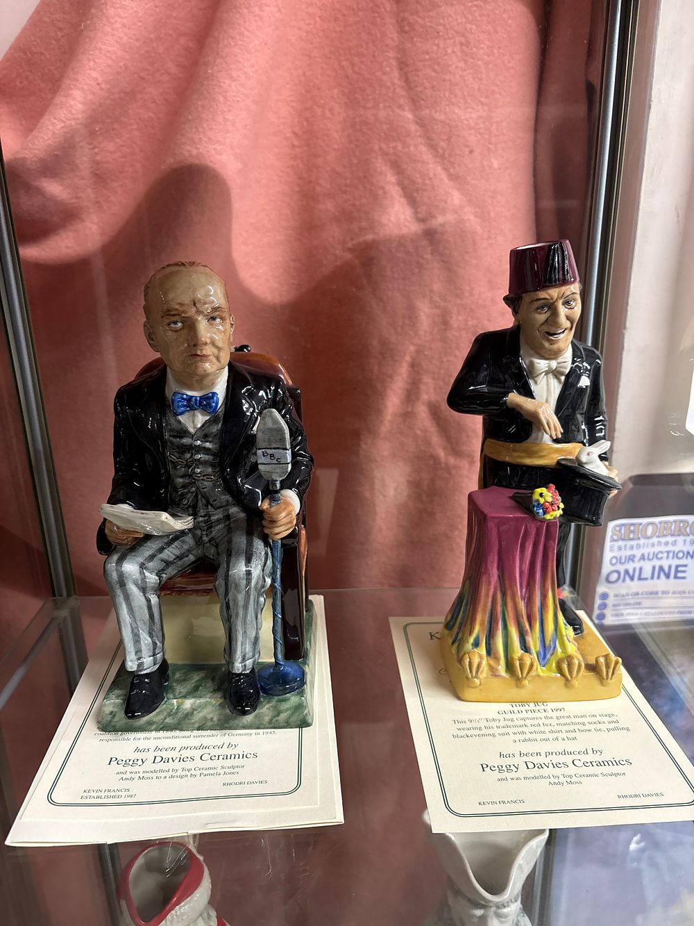 Lot 557: A Pair of Two Peggy Davies Ceramics Hand Painted Toby Jugs Depicting Tommy Cooper and Winston Churchill