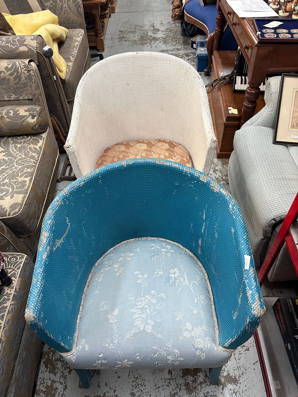 Lot 566: A Pair of Two Mid-Twentieth Century Lloyd Loom style Woven Tub Chairs