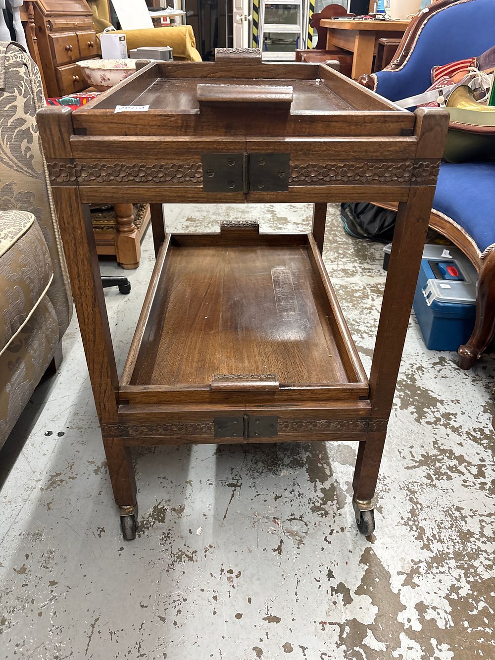 Lot 567: An Arts & Crafts Style Oak Two-Tier Tea Trolley with Removable Trays