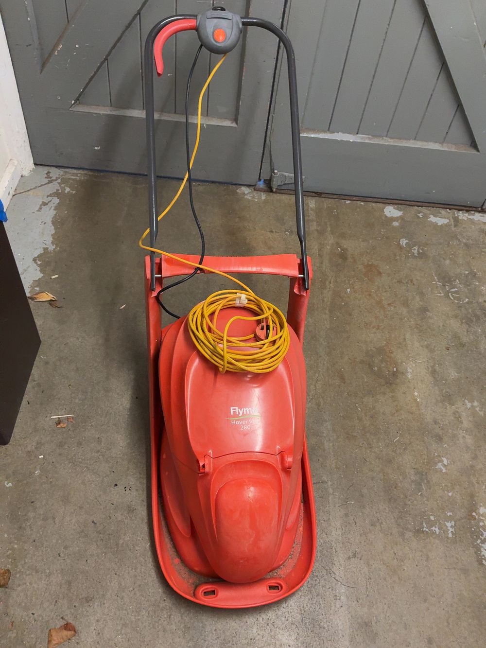 Lot 10: A Flymo Hover Vac 280 Electric Hover Collect Lawnmower