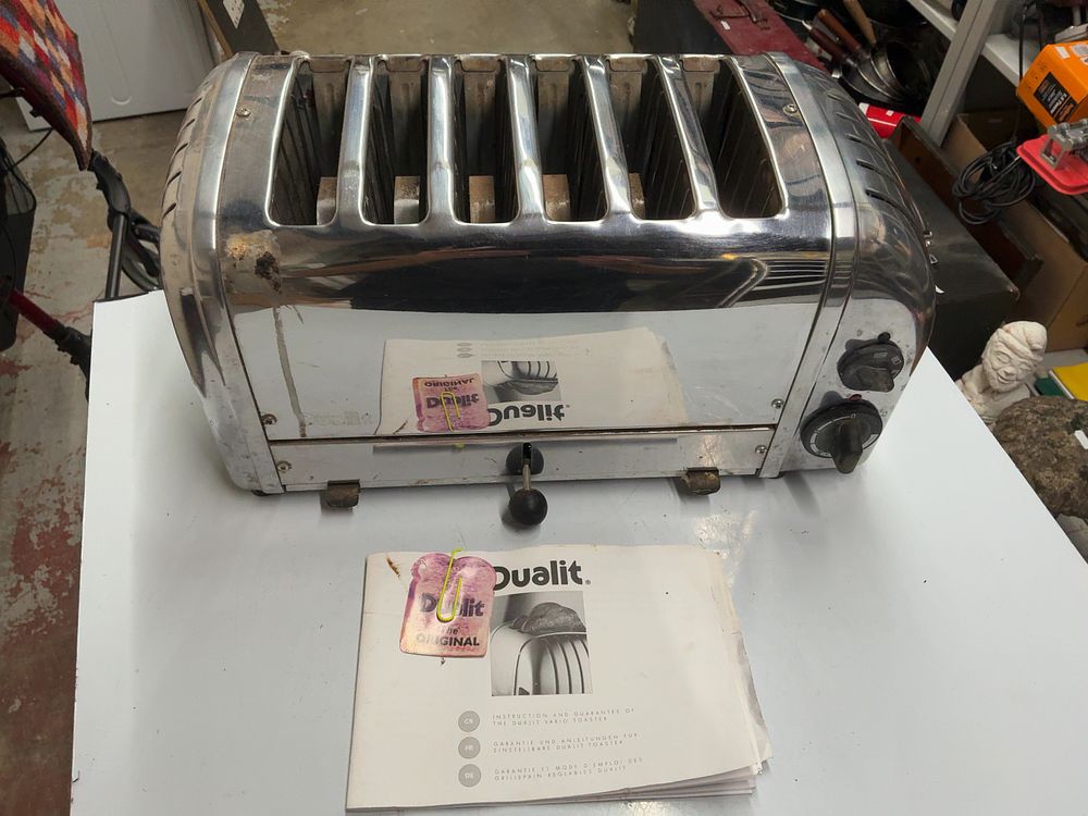 Lot 12: A Dualit 6SL GB Polished Stainless Steel Six Slice Vario Toaster with Instruction Manual