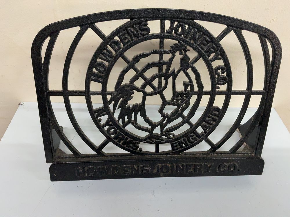 Lot 25: A Howdens Joinery Co. Cast Iron Advertising Cookery Book Stand with Cockerel Motif