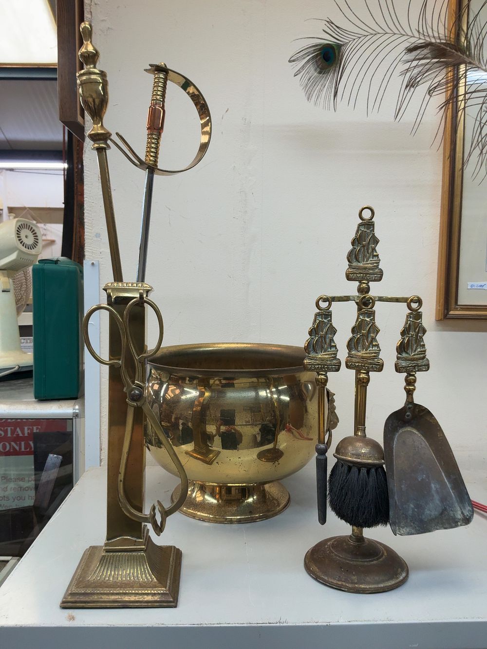 Lot 40: A Trio of Brass Fireplace Items including a Sword-Hilted Companion Tool and a Miniature Set