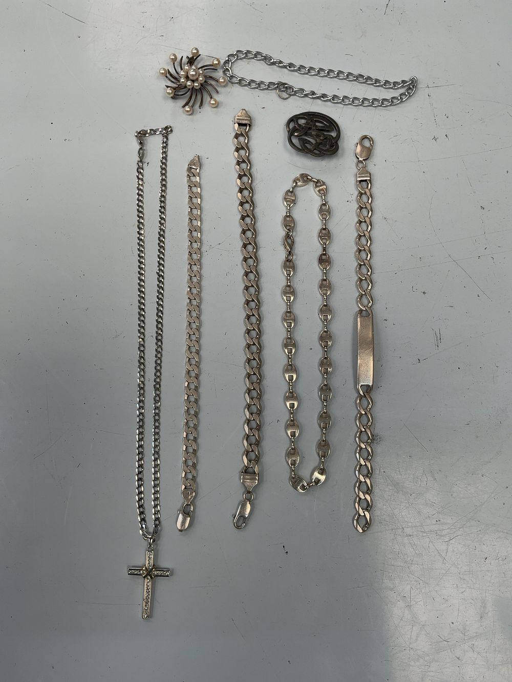 Lot 44: A Collection of Sterling Silver and White Metal Jewellery including Bracelets and Brooches