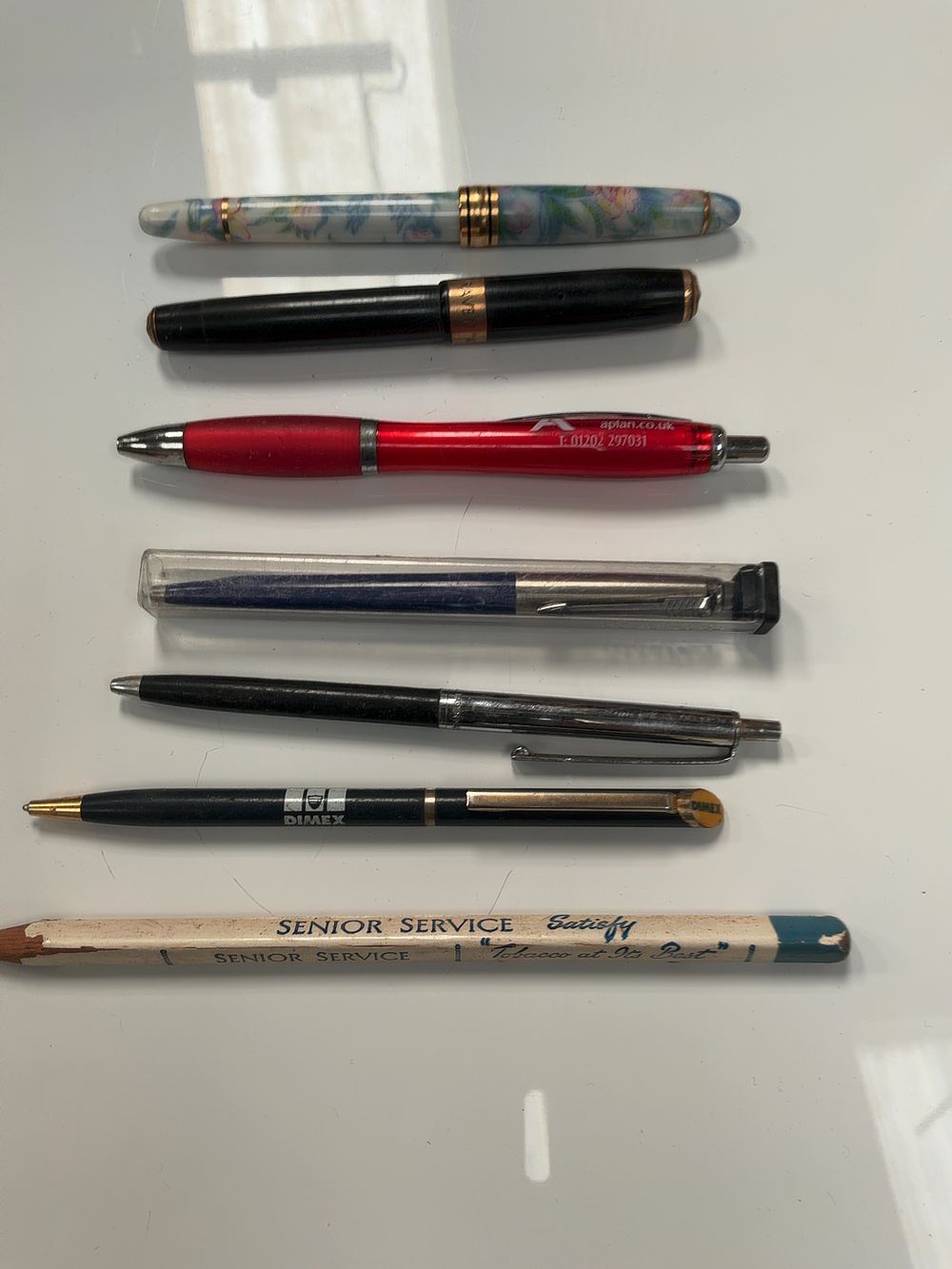 Lot 64: A Collection of Writing Instruments Including Craven A and Senior Service Examples