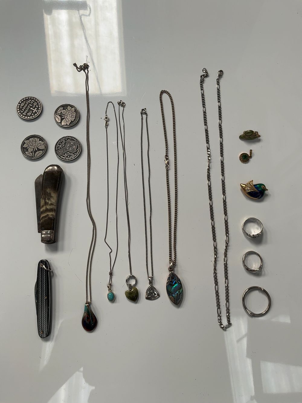 Lot 69: A Collection of Silver and White Metal Jewellery and Personal Effects including Pocket Knives and Brooches
