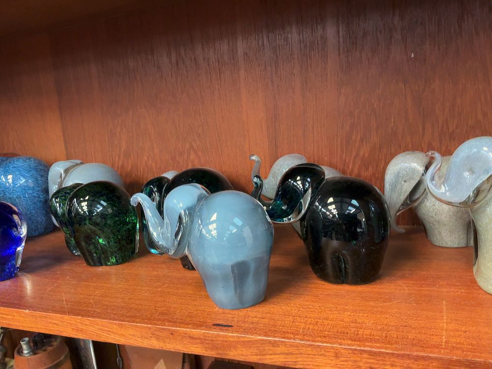 Lot 78: A Collection of Studio Glass Elephant Figurines and a Paperweight including Wedgwood, Caithness, Langham, and Avondale Examples