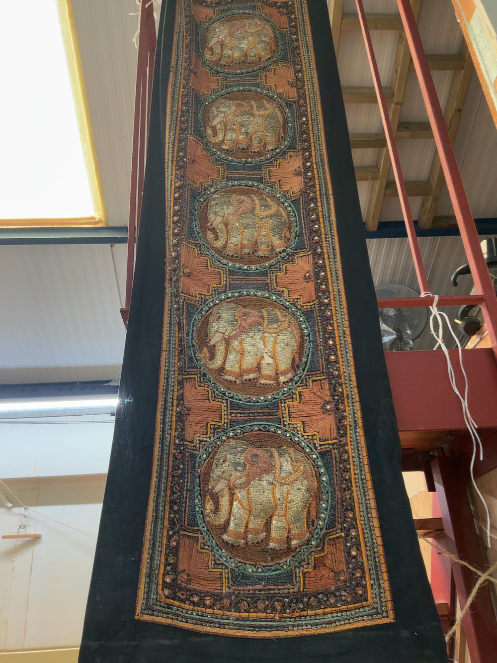 Lot 81: A Burmese style Embroidered Kalaga Textile Wall Hanging Featuring Elephant Medallions