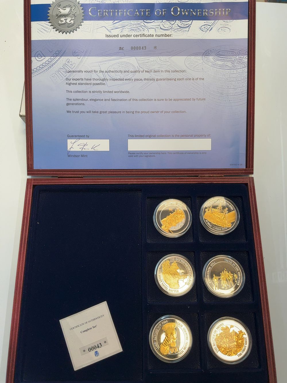 Lot 83: A Collection of Six WWI Centenary Commemorative Windsor Mint Silver-Plated Copper Medals with Presentation Case