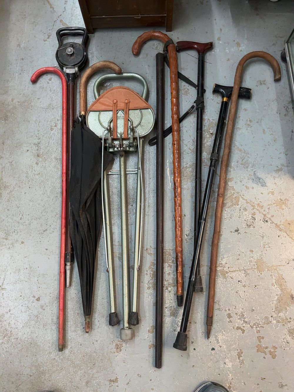 Lot 85: A Collection of Assorted Walking Sticks and Accessories including a System Cane and a Shooting Stick