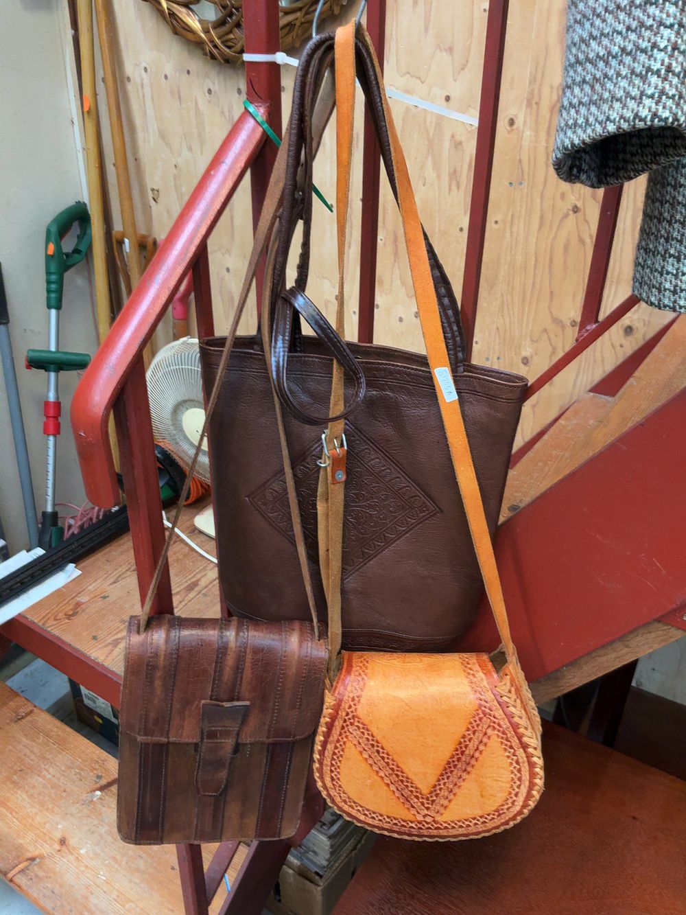 Lot 88: A Collection of Four Vintage Tooled and Embossed Leather Bags
