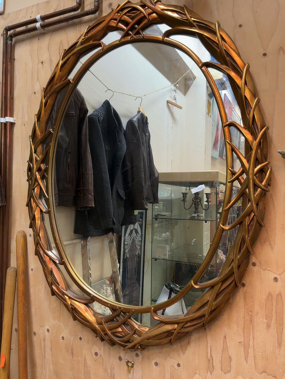 Lot 90: A Contemporary Gilt Metallic Finished Composite Oval Wall Mirror