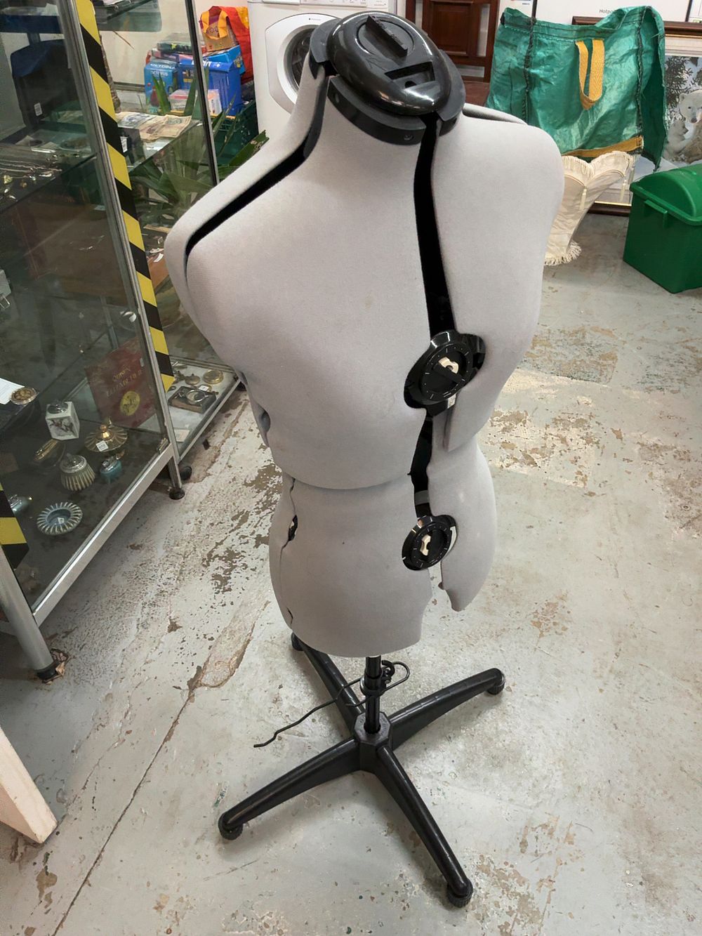 Lot 94: A Height Adjustable Grey Fabric Eight-Part Dressmaker's Dummy with Pedestal Base and Hem Gauge