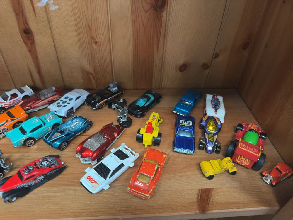 Lot 100: A Collection of Approximately 40 Toy Vehicles including a White Sports Car marked 007
