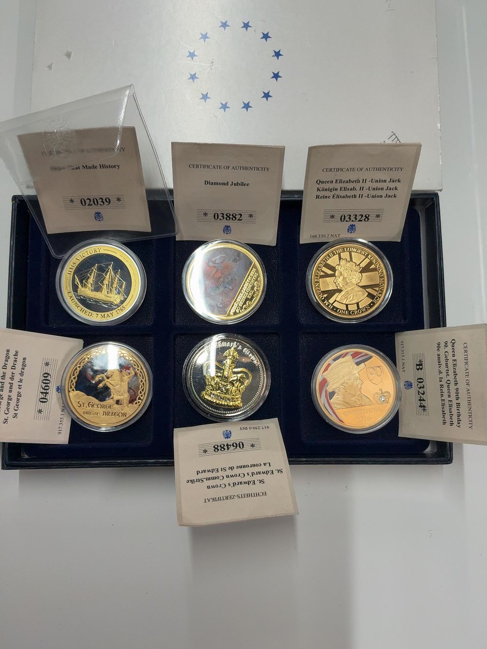 Lot 103: A Set of Six Queen Elizabeth II and British History Commemorative Medals and Coins in Presentation Case