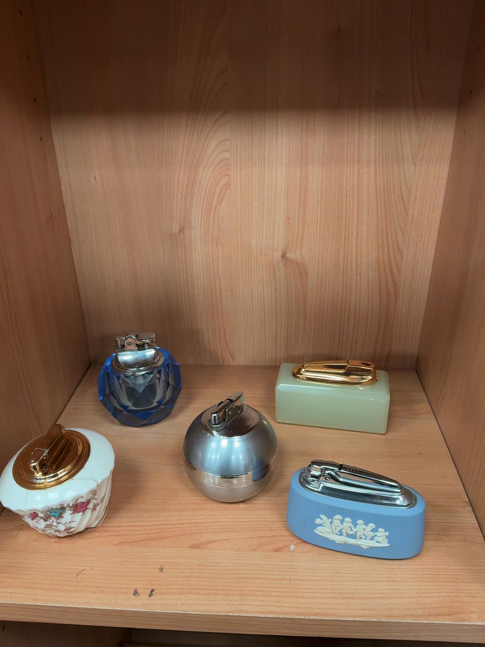 Lot 115: A Collection of Vintage Table Lighters in Various Materials Including Ronson, Minton and Colibri Examples