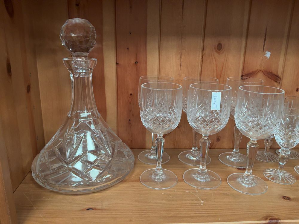 Lot 126: A Collection of Cut Crystal Glassware Including Two Decanters and Stemware