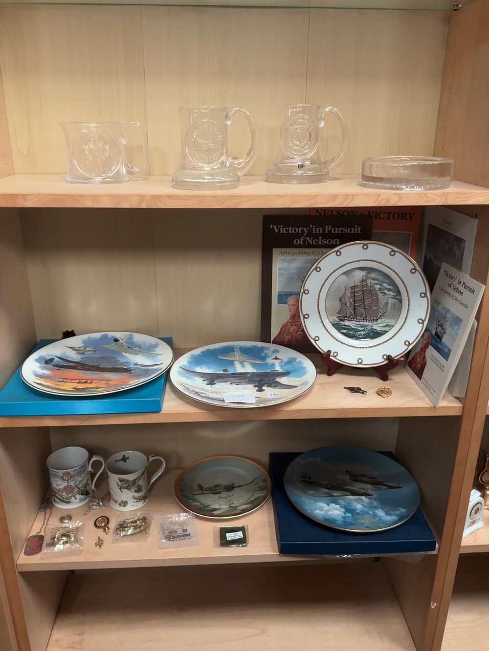 Lot 138: A Collection of Glass and Ceramic Commemorative Militaria including Dartington England and Royal Air Force Examples