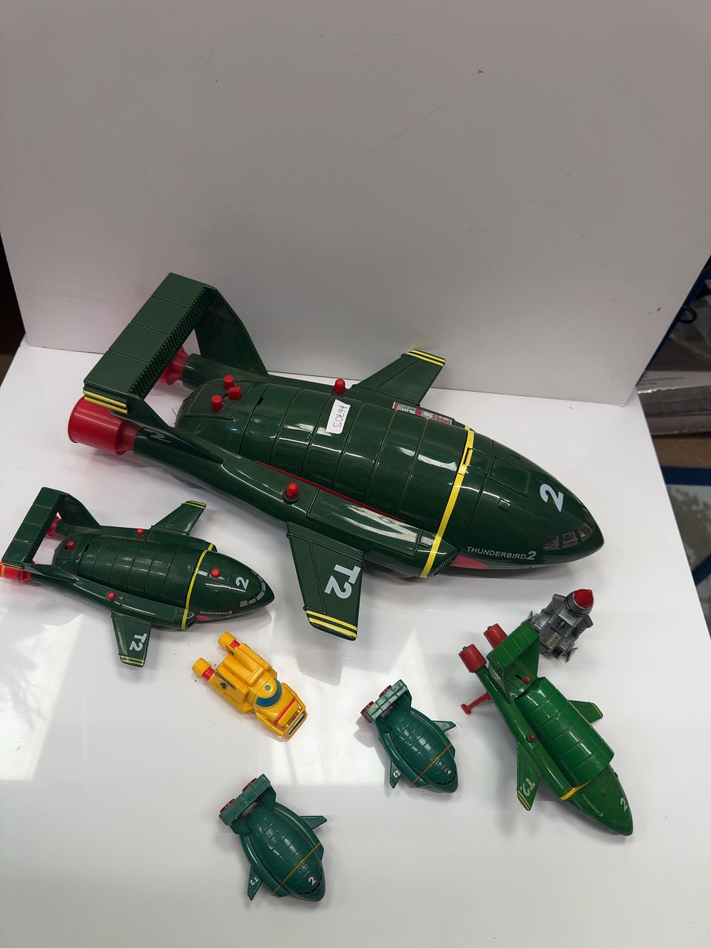 Lot 139: A Collection of Seven 1992 Bandai Thunderbirds Toy Vehicles Including Thunderbird 2, Thunderbird 4, and The Mole