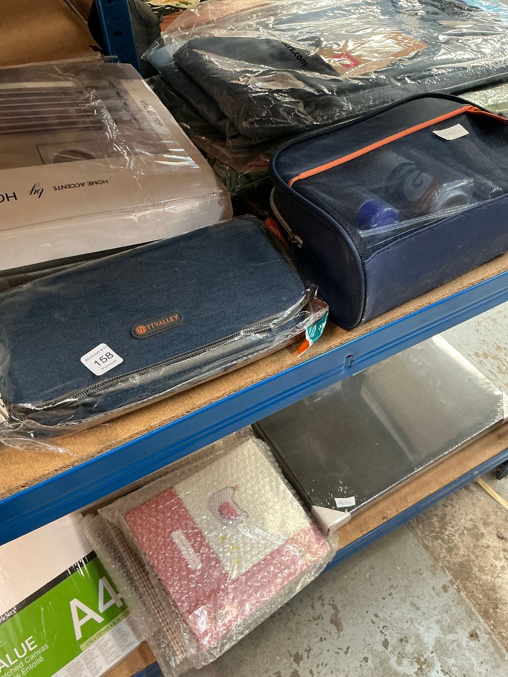 Lot 158: A Collection of New Consumer Goods Including Cotton Traders Apparel and Daler Rowney Art Supplies