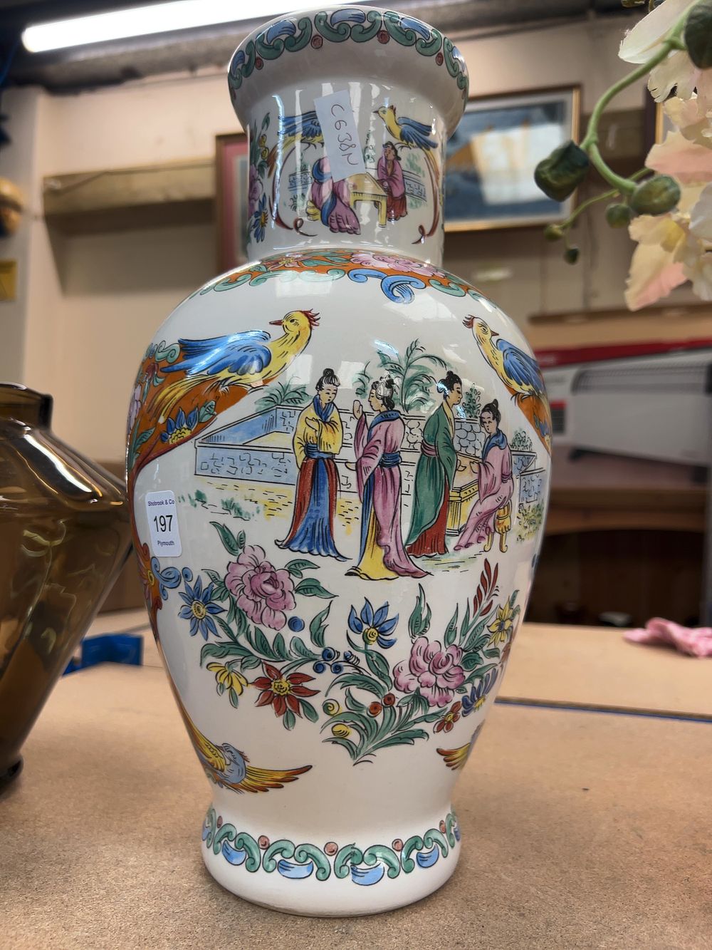 Lot 197: A Collection of Four Porcelain and Glass Vases