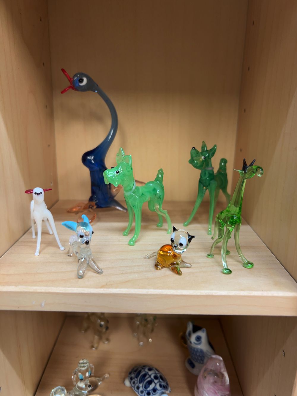Lot 202: A Collection of Glass Metal and Ceramic Animal and Decorative Figurines