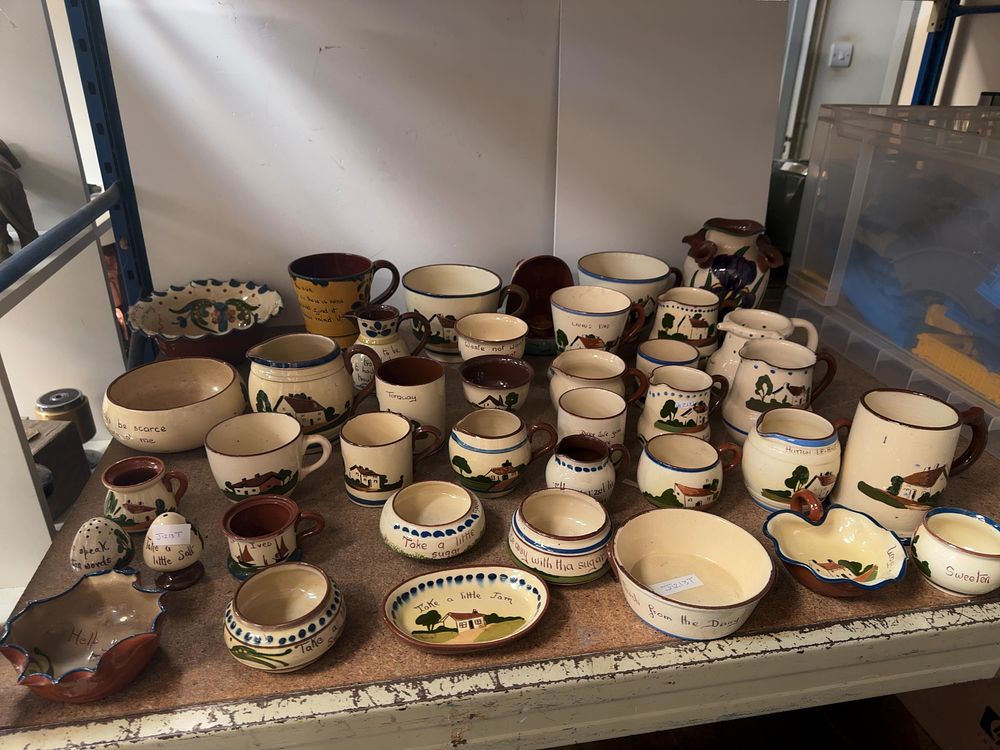 Lot 216: A Collection of Approximately 40 Torquay style Motto Ware Earthenware Pottery Items including Watcombe Examples