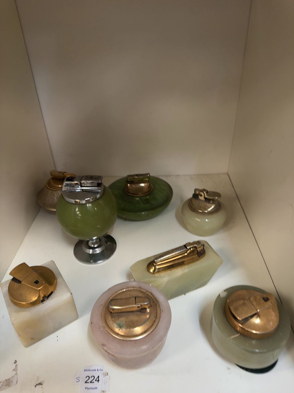 Lot 224: A Collection of Vintage Onyx and Alabaster style Table Lighters including Colibri Examples