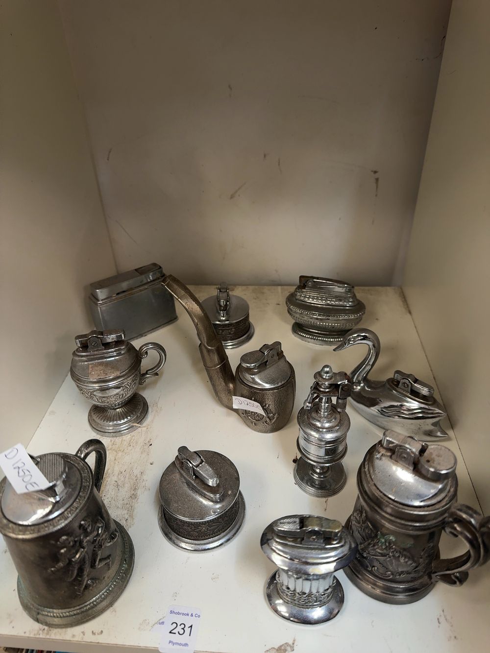 Lot 231: A Collection of Metal and Chrome Plated Novelty Table Lighters including Fisher, Rolstar and Hadson Examples