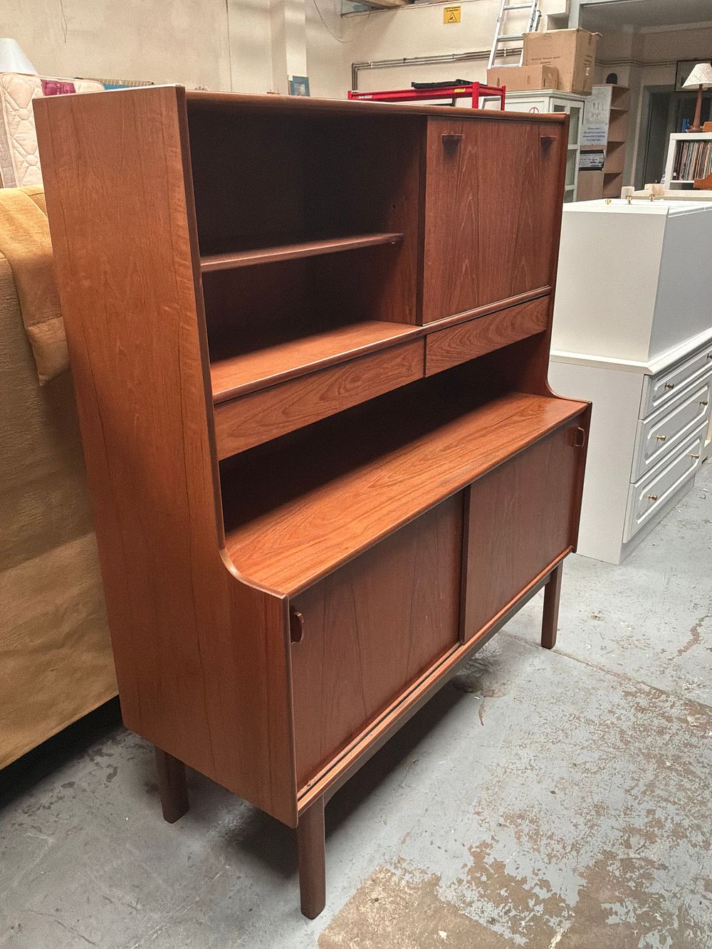 Lot 249: A Mid-Century Modern Scandinavian Style Possibly Teak Veneered Highboard