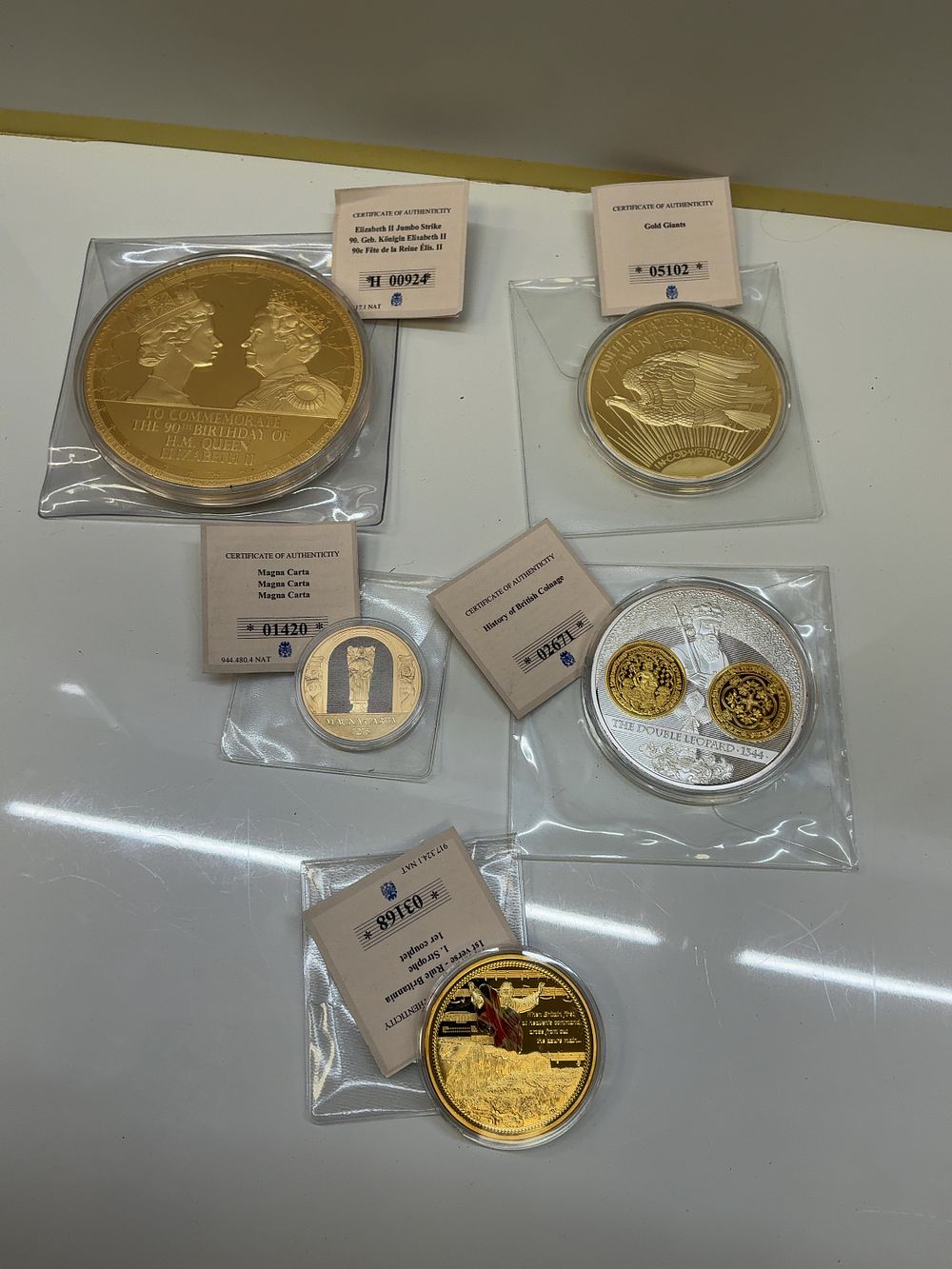 Lot 254: A Set of Five Gold and Silver-Plated Copper Commemorative Medals with Certificates of Authenticity