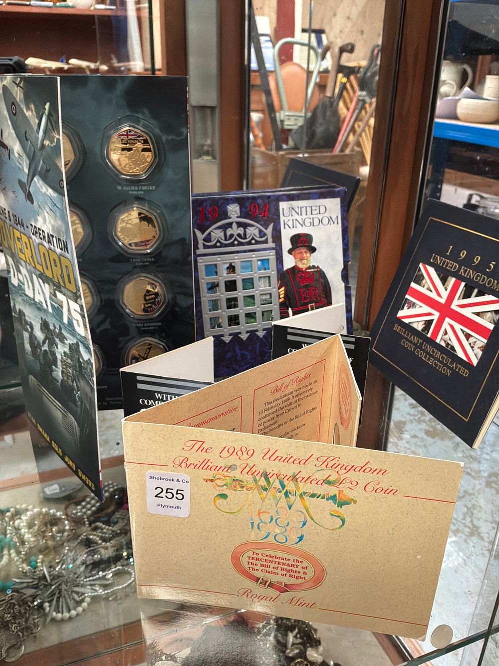 Lot 255: A Collection of UK Brilliant Uncirculated Coin Sets and Commemorative Folders including Royal Mint Examples