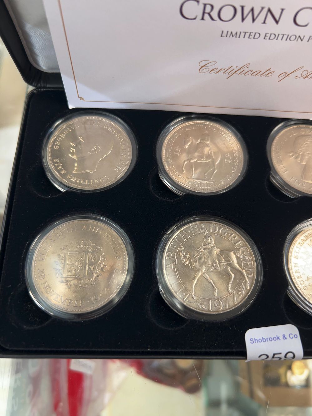 Lot 259: A Collection of Eight UK Commemorative Crown Coins in Presentation Case