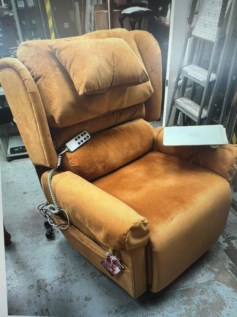 Lot 270: A Contemporary Primacare Fabric Upholstered Dual-Motor Bariatric Rise and Recline Armchair
