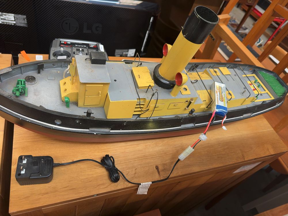 Lot 275: A Large Scale Radio Controlled Model Tugboat with Axion and Joysway Transmitters and Accessories