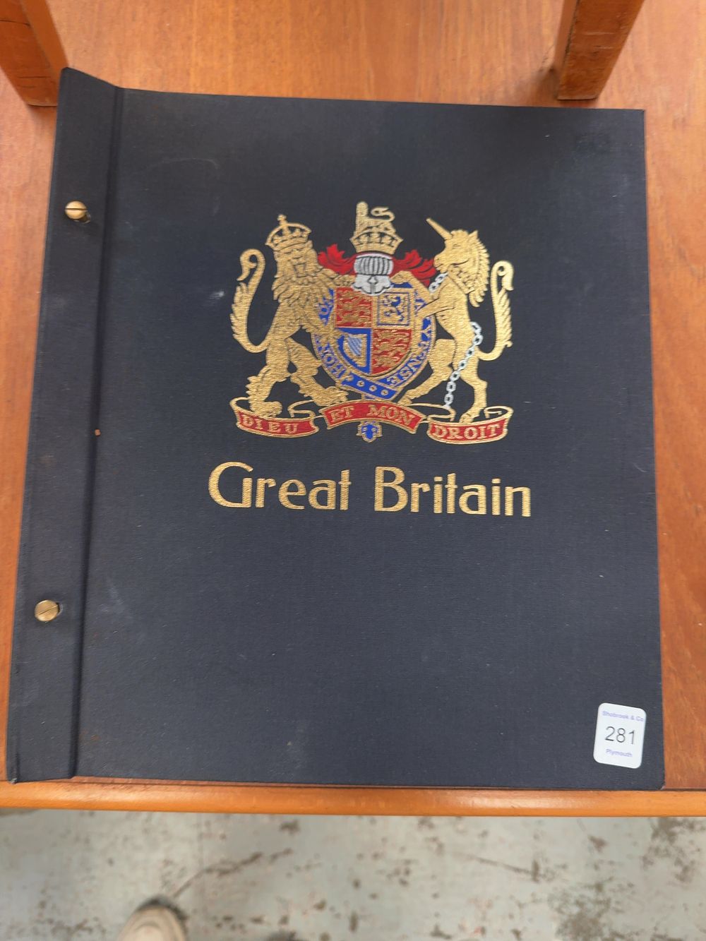 Lot 281: A Collection of UK Stamps Housed in a DAVO Printed Screw-Post Binder