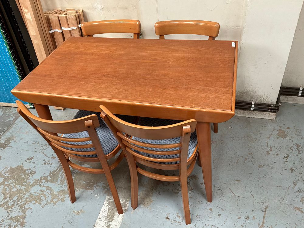 Lot 282: A Set of Five Mid-Century Modern Teak and Teak Veneered Dining Items comprising a Table and Four Chairs