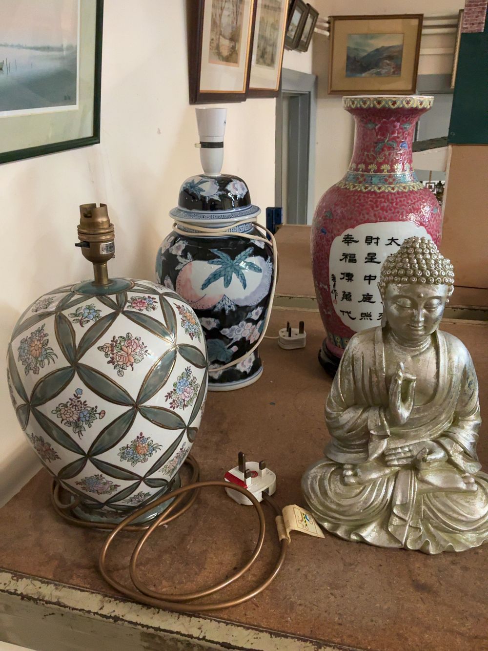 Lot 285: A Collection of Two Chinese style Porcelain Table Lamps a Porcelain Vase and a Buddha Figurine