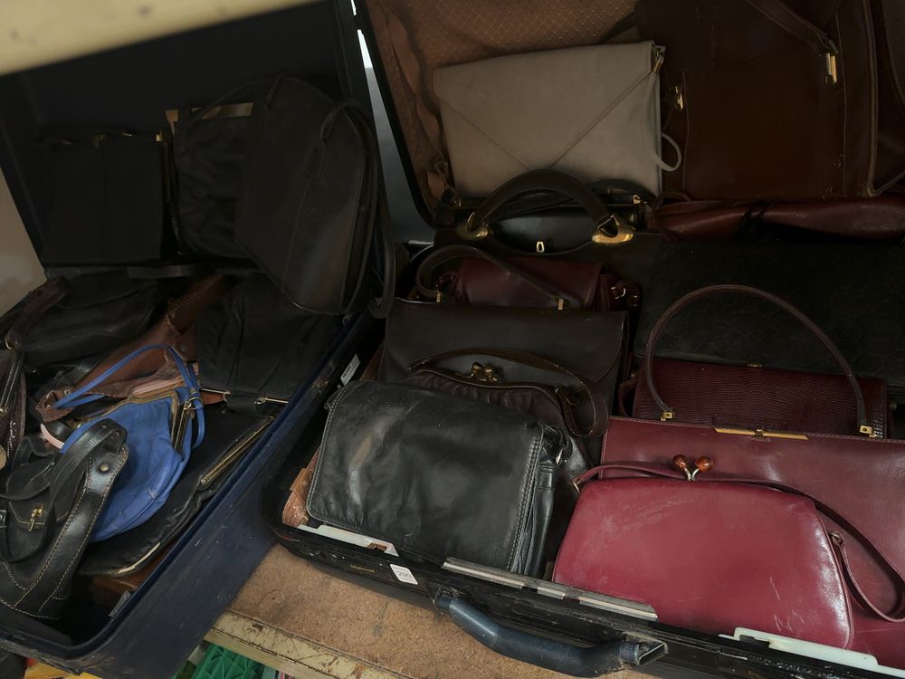 Lot 290: A Collection of Vintage Leather and Possibly Snakeskin Handbags and Clutches in Two Suitcases