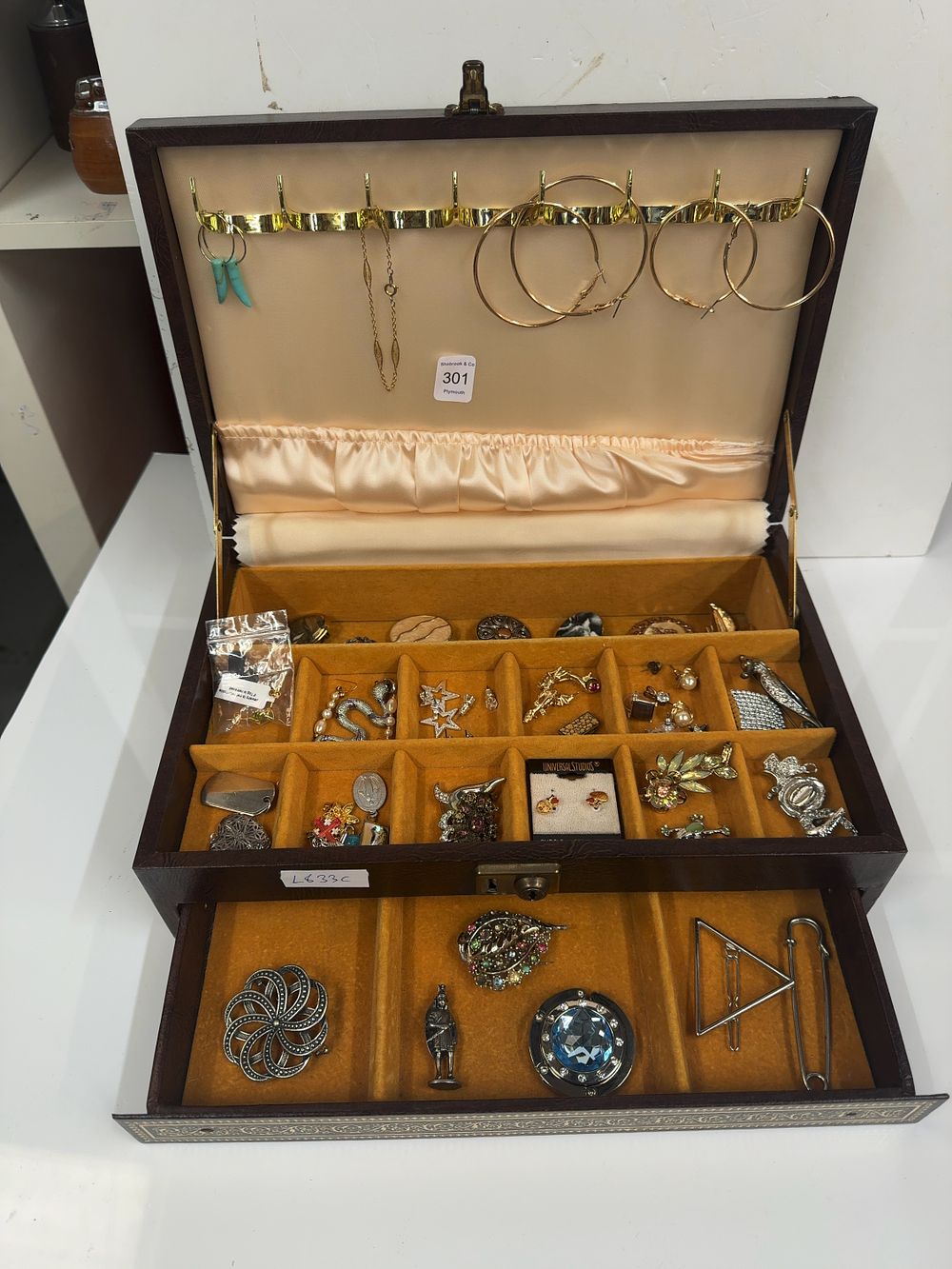 Lot 301: A Collection of Costume and Vintage Jewellery including Universal Studios Earrings in a Two-Tier Jewellery Case